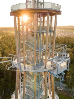 Tower in evening light, sun rays breaking through the metal structure, Himmelsglück observation