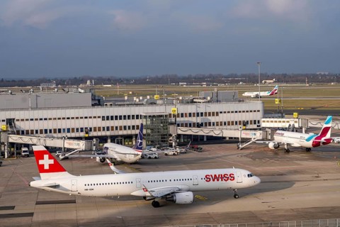 Düsseldorf airport, DUS, terminal A Eurowings aircraft at the gate, Swiss Airbus A321-200 aircraft