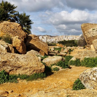 View through boulders of the modern city of Agrigento, Valley of the Temples, Agrigento, Sicily,