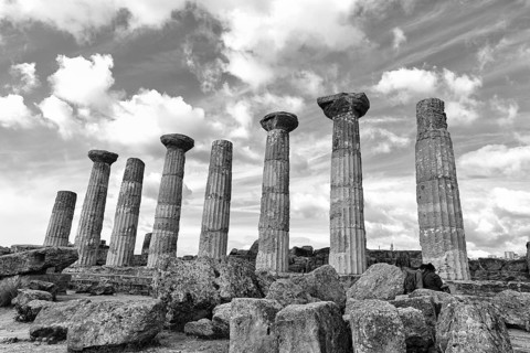 Eight pillars, Temple of Heracles, ruins in the Valley of the Temples, restoration, monochrome,