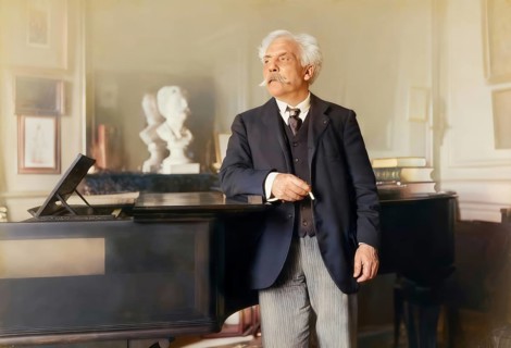 Gabriel Fauré, 1845 – 1924, French composer, next to his piano in his appartement, Boulevard