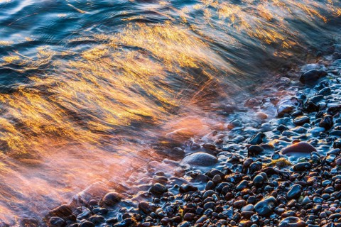 Wave play at sunrise on the chalk coast in Jasmund National Park, Rügen, Sassnitz,