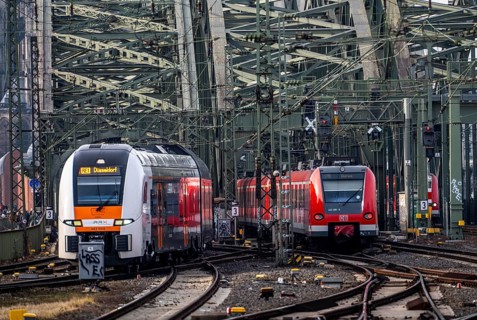 Rail system in front of Cologne Central Station, Hohenzollern Bridge across the Rhine, RRX,