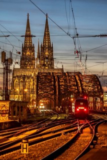Rail track in front of Cologne Central Station, Hohenzollern Bridge across the Rhine, regional