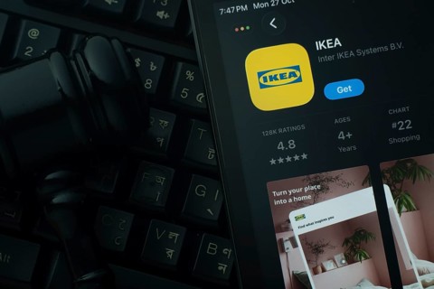 Dhaka, Bangladesh- 28 Oct 2025: An iPad displaying the IKEA app against a judge's gavel and dark