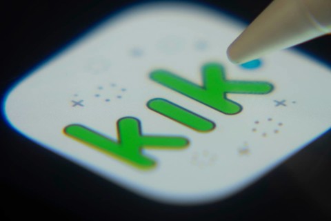 Dhaka, Bangladesh- 06 Dec 2025: Close-up of the Kik app on a screen with a stylus pointing at it
