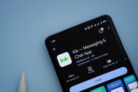 Dhaka, Bangladesh- 29 May 2025: On a blue surface, a smartphone displays the Kik app within the
