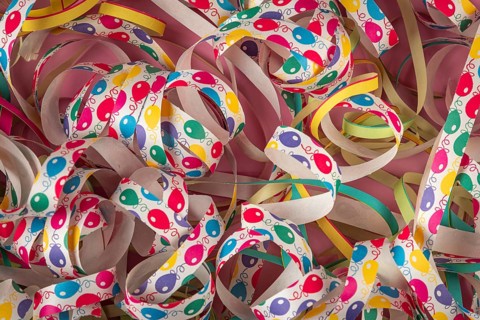 Colourful streamers with balloon patterns in different colors, carnival