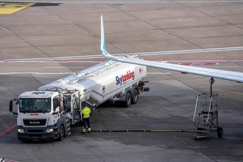Refueling an aircraft after landing, in front of takeoff, air fuel, kerosene, Skytanking tank truck