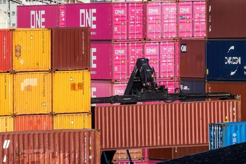 Colourful sea containers in the container port. The port of Mannheim is one of the most important