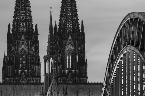 Evening atmosphere, Cologne Cathedral illuminated with LED lamps and the Hohenzollern Bridge,