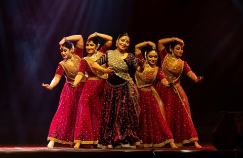Artists perform a classical dance during a cultural evening program at Shilpgram Mohotsav 2026 in