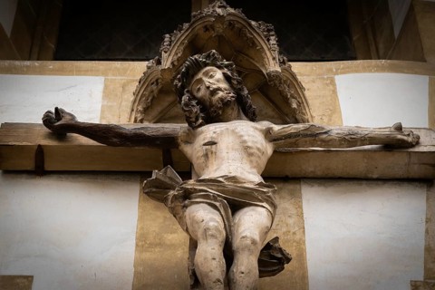 Christ sculpture from the former monastery church of S. Johannes Baptistam above portal of the