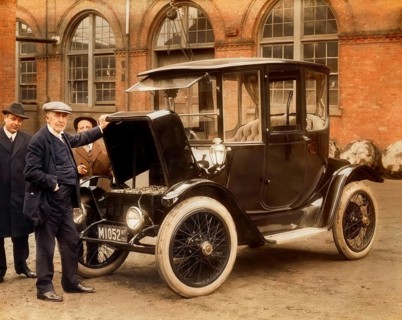 Thomas Alva Edison displaying storage batteries of the power Detroit Electric automobile, 1913,