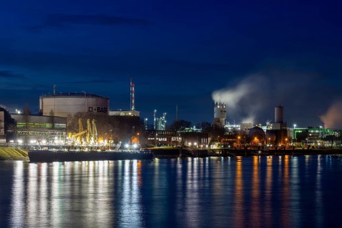 Evening shot of BASF in Ludwigshafen with the Rhine in the foreground
