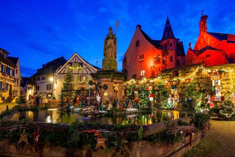 Houses illuminated and decorated for Christmas, Christmas market, blue hour, Eguisheim, Haut-Rhin