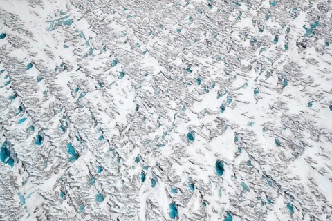 Aerial view of meltwater on the Greenland ice sheet, Arctic landscape, frozen wilderness, glaciers