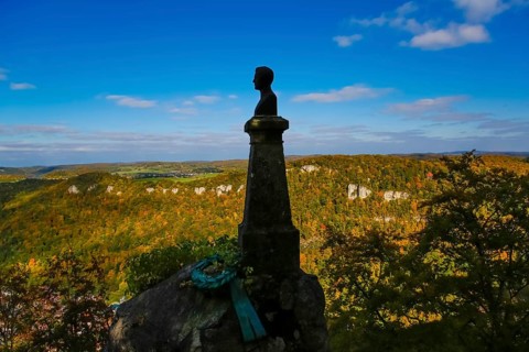 Wilhelm Hauff memorial, rocks above the Echaz Valley, monument from 1839, obelisk with bronze bust,