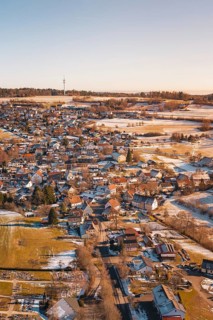 Winter village view with snow-covered roads and surrounding fields, Hallwangen, Freudenstadt