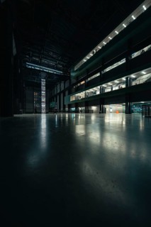 Expansive, dark room with industrial design, Tate Modern of Art, Lodon, United Kingdom