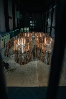 Wooden maze in a dark, modern setting, Tate Modern of Art, Lodon, United Kingdom