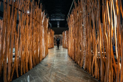 A path lined with wooden bars in an art installation, Tate Modern of Art, Lodon, United Kingdom