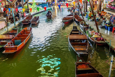 Wooden boats on the Damneon Saduak floating markets channel, near Bangkok, Ratchaburi district,