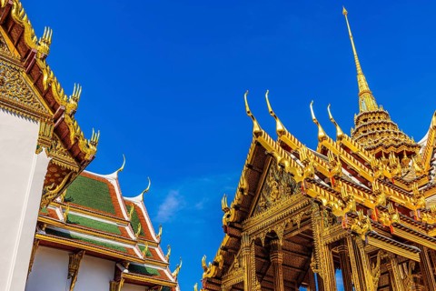 The Grand Royal Palace, the gilded Abhorn Bimok Pavilion with overlapping roofs and curved chofas,