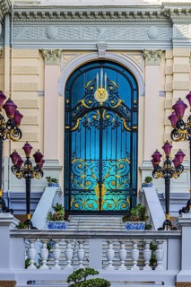 The Grand Royal Palace, side entrance with decorated gate and multi-armed lanterns, Chakri Maha