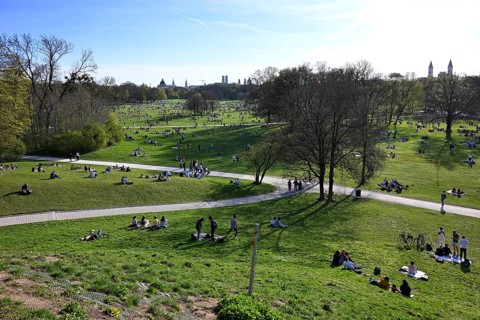 View of the southern English Garden from Monopteros, many people enjoying summer, Munich, Bavaria,