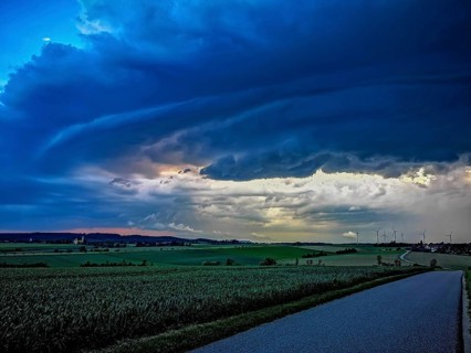 Supercell, approaching thunderstorm with impressive and threatening cloud formation, a thunderstorm