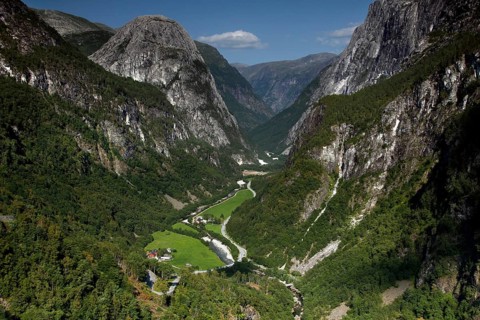 Breathtaking view of the Nærøy Valley with green valley floor and steep rock walls, Stalheim,
