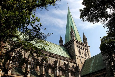 Gothic cathedral with high tower and cloudy sky, Trondheim, Trøndelag, Norway