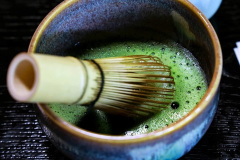 Traditional matcha tea ceremony with a bamboo broom and bowl, Kyoto, Higashiyama, Japan