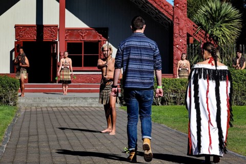 Traditional Maori welcome ceremony in front of a cultural house, Rotorua, Te Puia, New Zealand