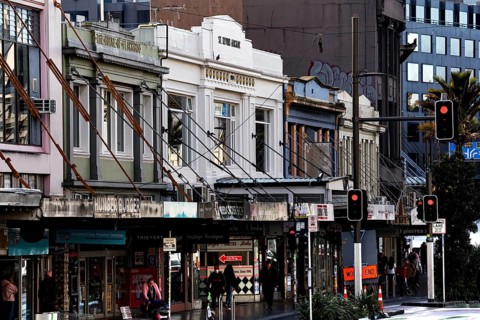 Karangahape Road with old buildings and shops in an urban setting, Auckland, New Zealand