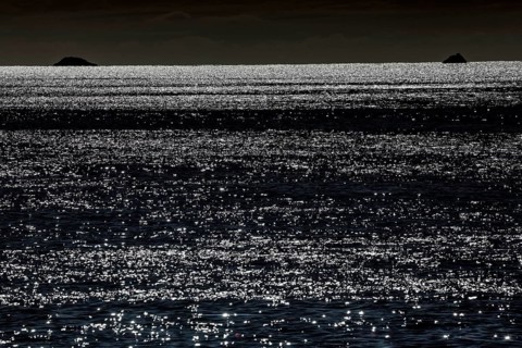 Shimmering water at night in the Bay of Islands, New Zealand, zero