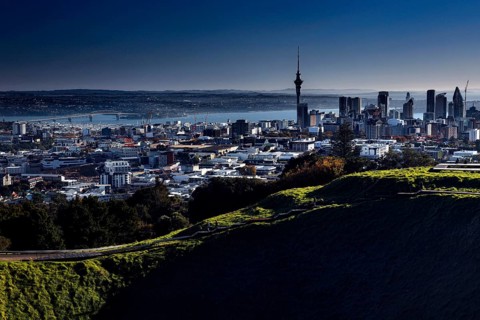 View of Auckland city and sea from Mt Eden under clear skies, Auckland, New Zealand