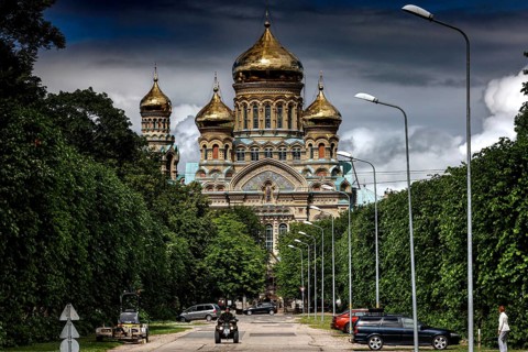 Impressive church with golden domes in Karosta, surrounded by green trees, Liepaja, Courland,