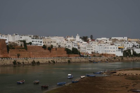 Riverside with historic buildings in Azemmour, quiet atmosphere under cloudy sky, Azemmour, zero,