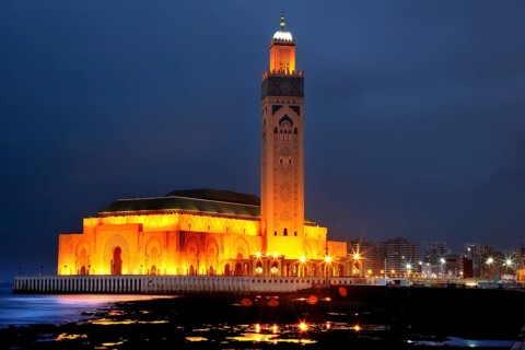 Beautifully illuminated mosque on the coast at night, Casablanca, Grand Casablanca, Morocco