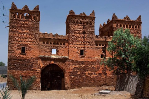 Historic clay kasbah in Agdz, characterized by traditional architectural elements, Agdz, Morocco
