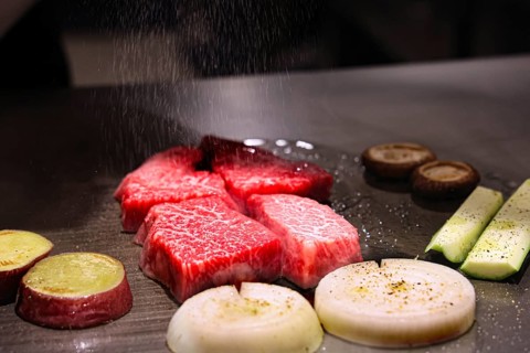 Preparation of Kobe beef and vegetables in Teppanyaki style, Kobe, Japan