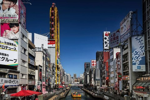 Dotonbori area with lively atmosphere, colorful billboards along the river, Osaka, Namba, Japan