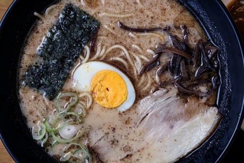 Bowl of ramen with egg and seaweed in a restaurant in Aso, Aso, Japan