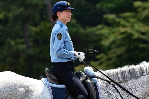 Mounted policewoman in uniform at Aoi Matsuri in Kyoto, Kyoto, Japan