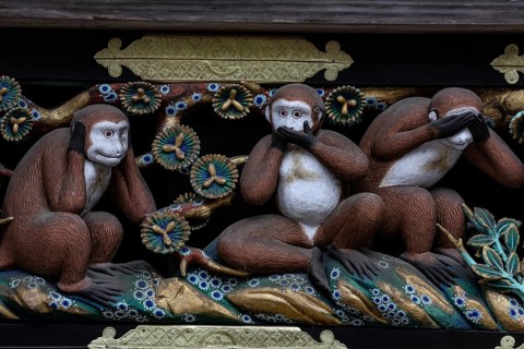 The three wise monkeys, known as Sanzaru, are depicted in relief at the shrine, Nikko, Japan