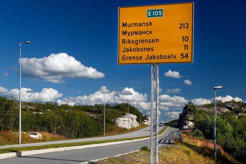 Distance sign to the Russian border on a clear road near Kirkenes, Kirkenes, Finnmark, Norway