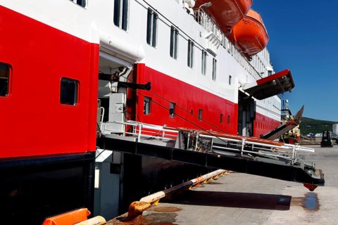 Gangway to Hurtigruten ship in Kirkenes harbour in sunny weather, Kirkenes, Finnmark, Norway