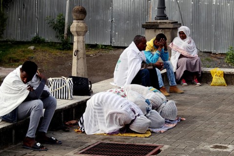 People gather praying in front of a church in Addis Ababa, Addis Ababa, Ethiopia
